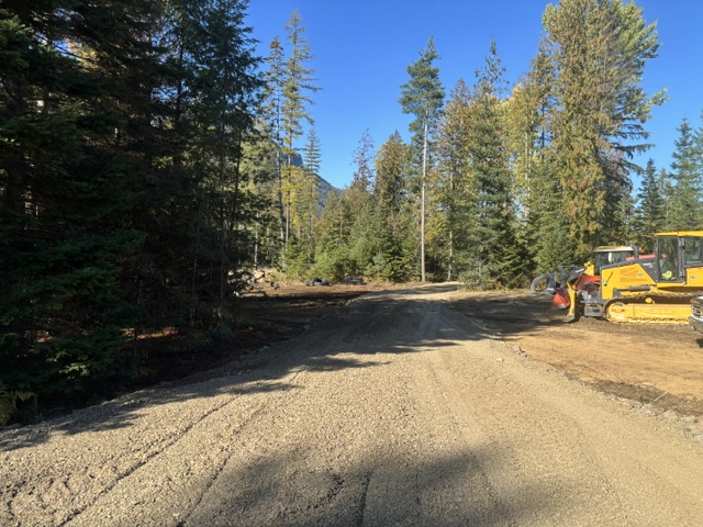Finished road grade with bulldozer on site — Clark Fork, ID